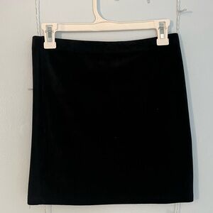Black velvet pencil skirt. Size: Medium Brand: Forever 21.